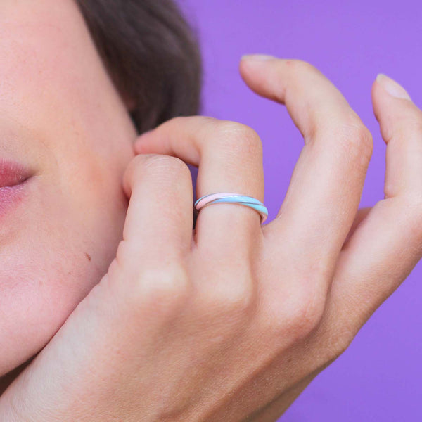 Rock Candy Bubblegum ring in platinum and blue, aqua and peach enamel worn on the model