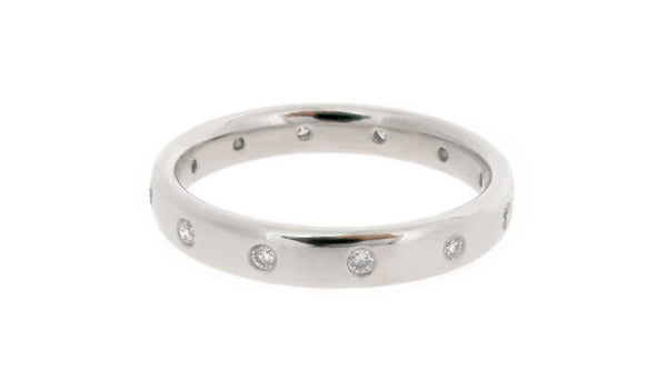 A white gold and diamond wedding ring by Origin 31