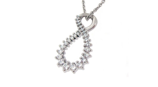 Diamond Infinity Necklace in white gold showing the mobius symbol