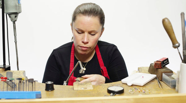 Jenny House at a jewellers bench making origin 31 jewellery for Goldsmiths Fair