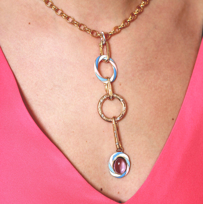 Long Pick N Mix Necklace Dangling From Heavy Gold Chain On A Model