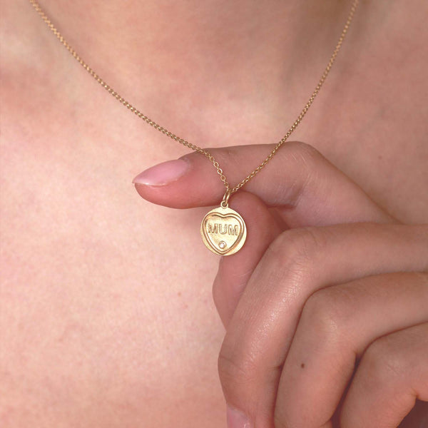 Love Hearts 18ct Mum Charm worn on a model with a gold chain