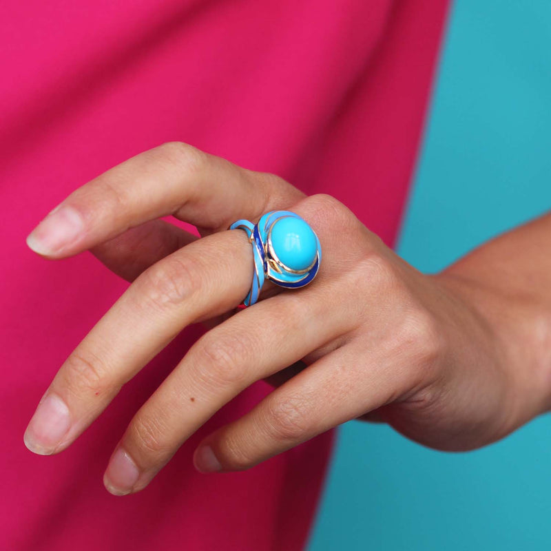 Rock Candy bespoke ring featuring a turquoise and blue enamel on 18ct yellow gold, worn on the hand